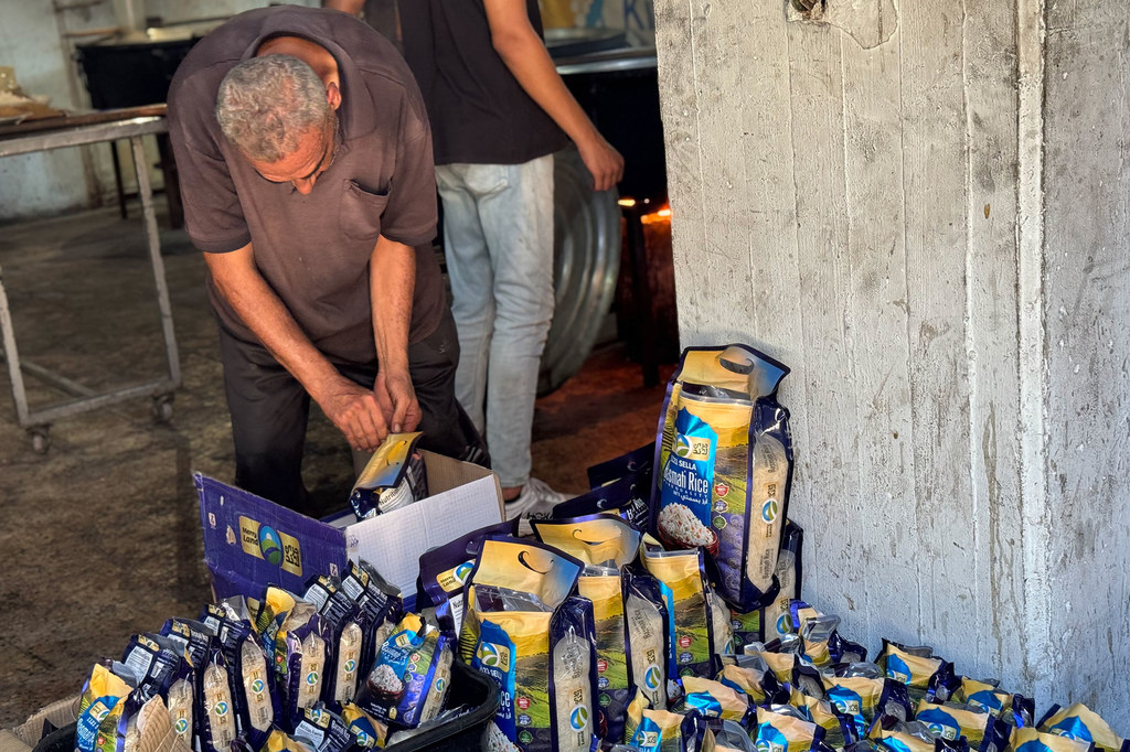 Gaza community kitchens provide essential hot meals to Palestinians affected by the humanitarian crisis.